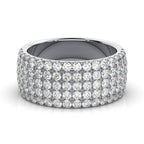 Diamond ring with multiple rows of sparkling stones on a white background
