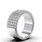 Silver ring with diamond accents on a white background
