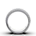 Silver ring with small diamonds on a white background