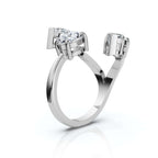 White gold ring with pear-shaped diamonds on a white background