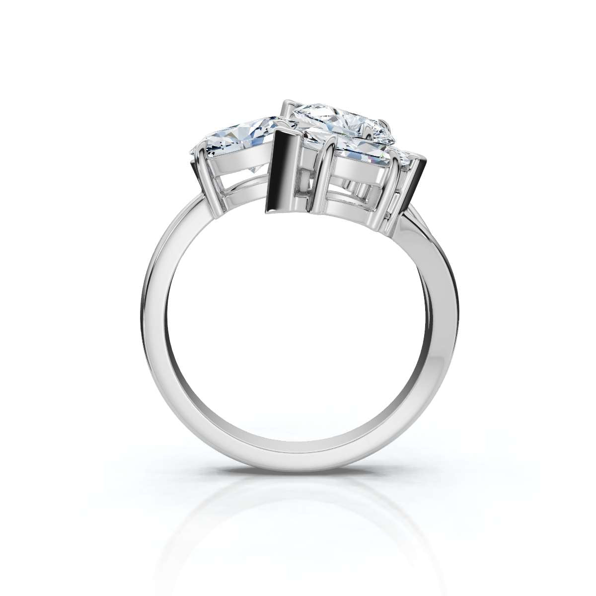 White gold ring with pear-shaped diamonds on a white background