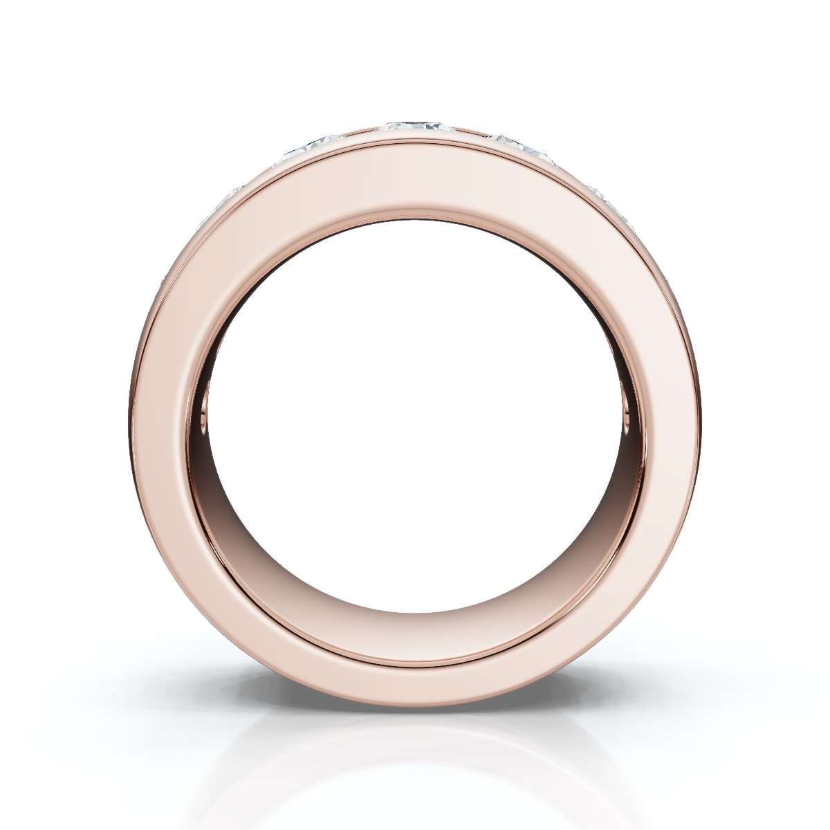Rose gold ring with nine embedded stones on a white background