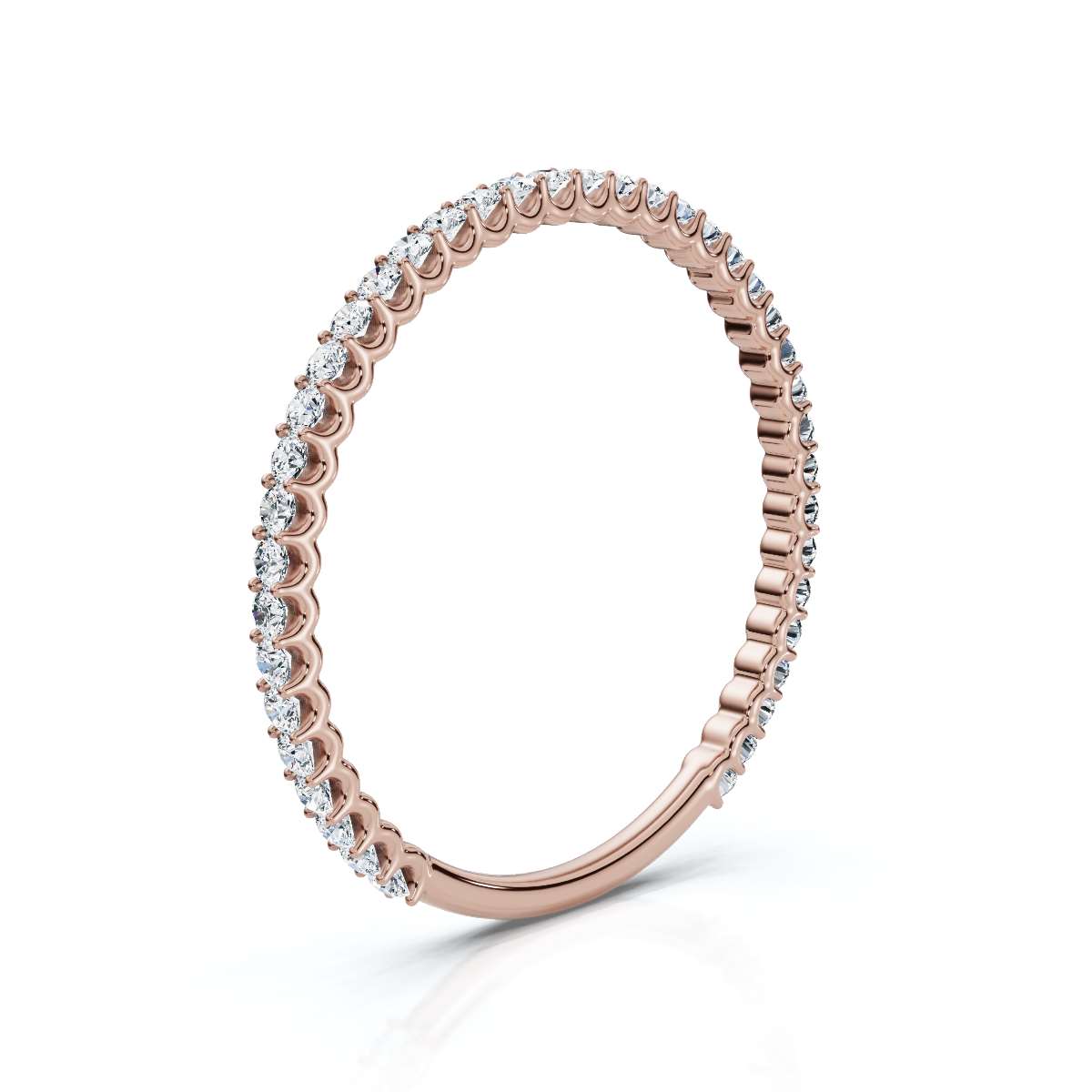 Rose gold ring with diamonds on a white background