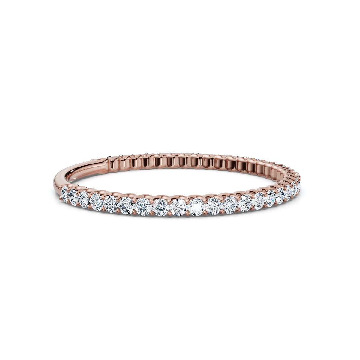 Rose gold ring with diamonds on a white background