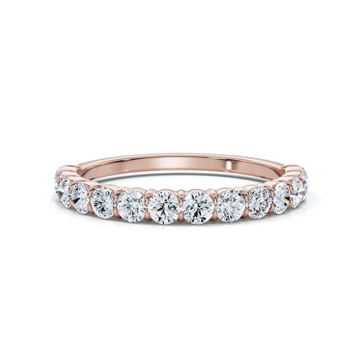 Rose gold ring with diamonds on a white background
