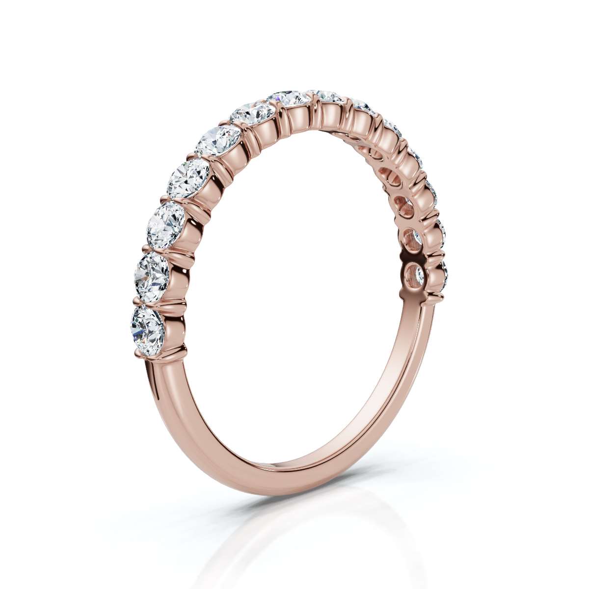 Rose gold ring with diamonds on a white background
