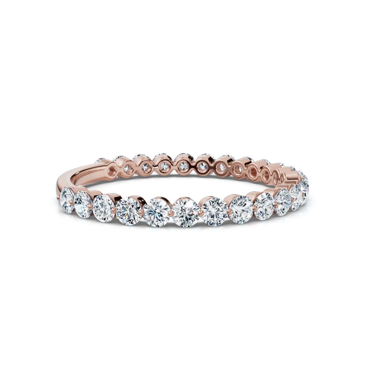 Rose gold and diamond eternity ring on a white background