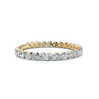 Gold and diamond ring on a white background