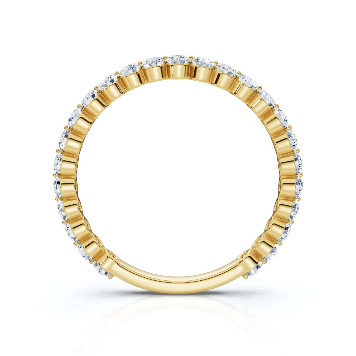 Gold ring with embedded diamonds on a white background